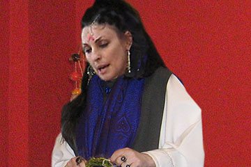 Donna giving a lecture at her Academy of Magick